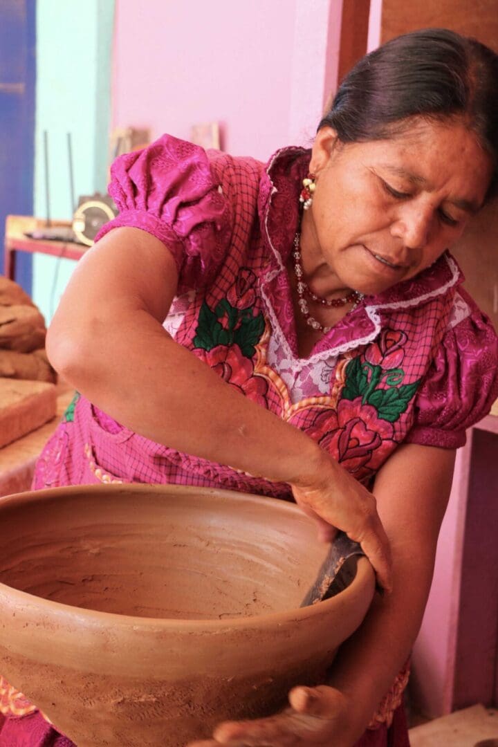 A Woman Making a Terracotta Pot