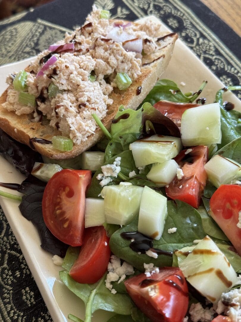 Tuna salad on toast with green salad.