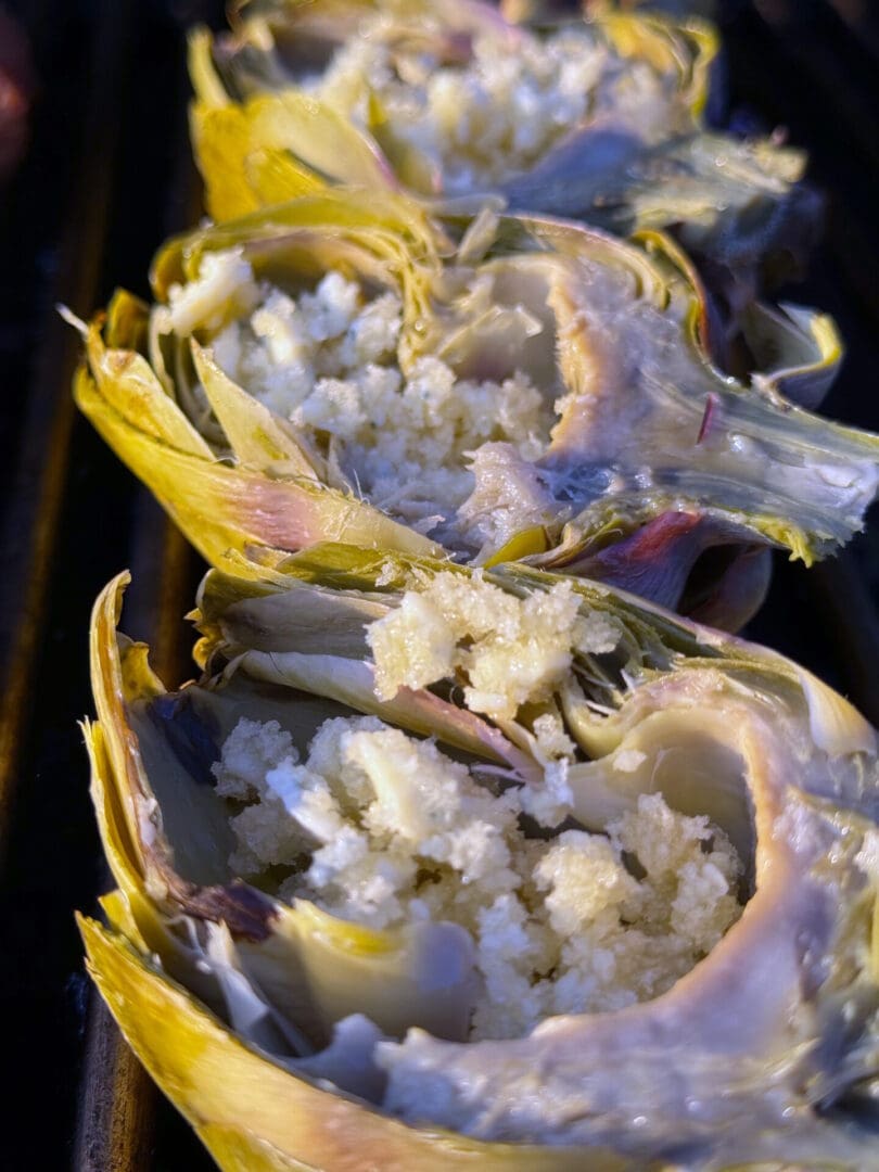 Grilled artichoke hearts with bread crumbs.