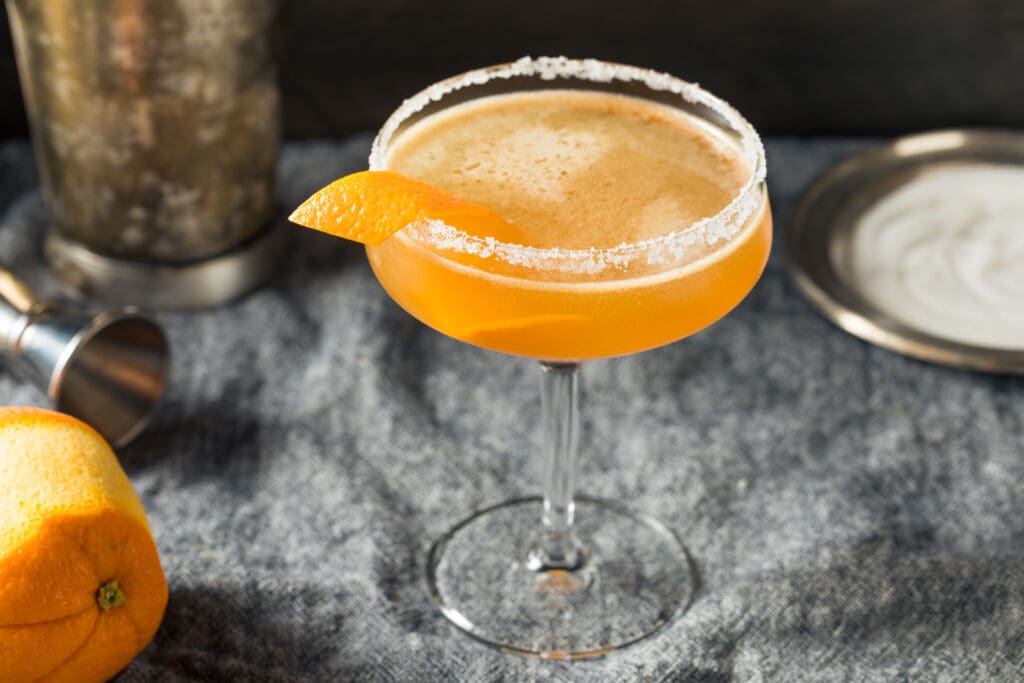 Orange peel garnish in a cocktail glass.