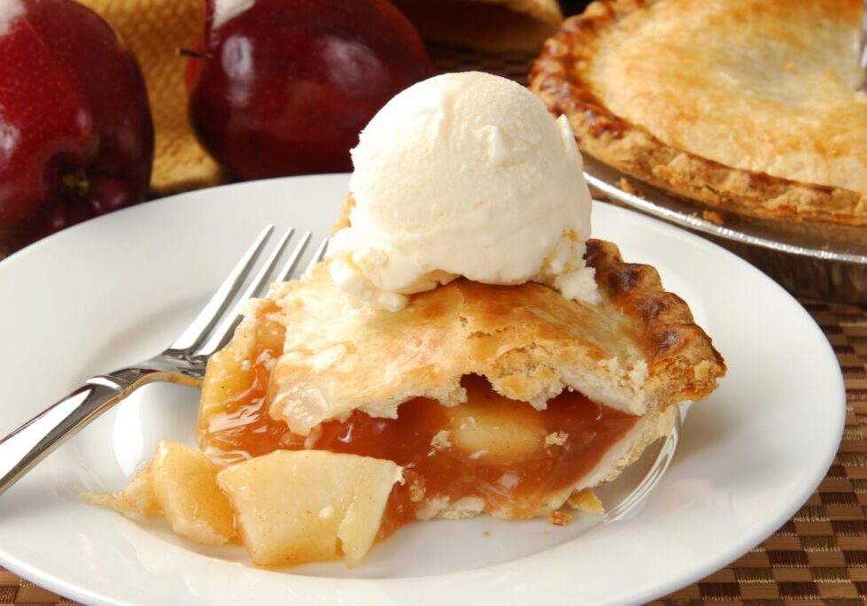 An Apple Pie Slice With a Scoop of Ice Cream