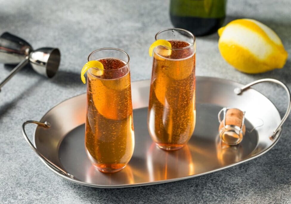 Boozy Refreshing French Kir Royale Champagne Cocktail with Lemon and Cassis