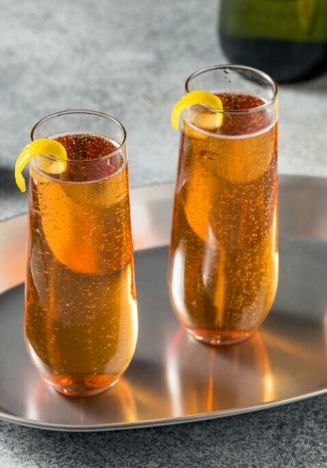 Boozy Refreshing French Kir Royale Champagne Cocktail with Lemon and Cassis