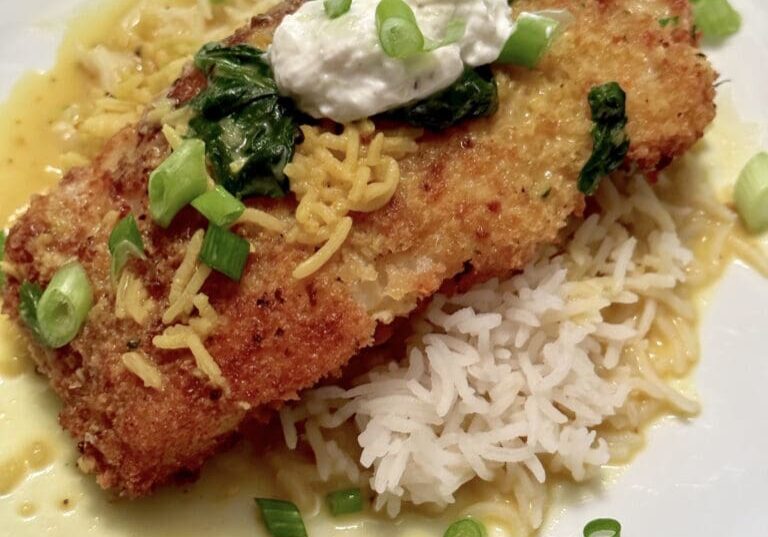 Fried Hake over Coconut rice with Tumeric sauc