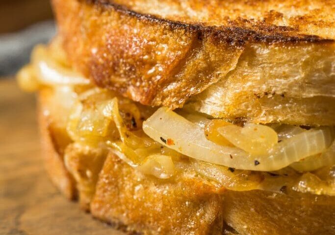 Grilled cheese sandwich with caramelized onions.