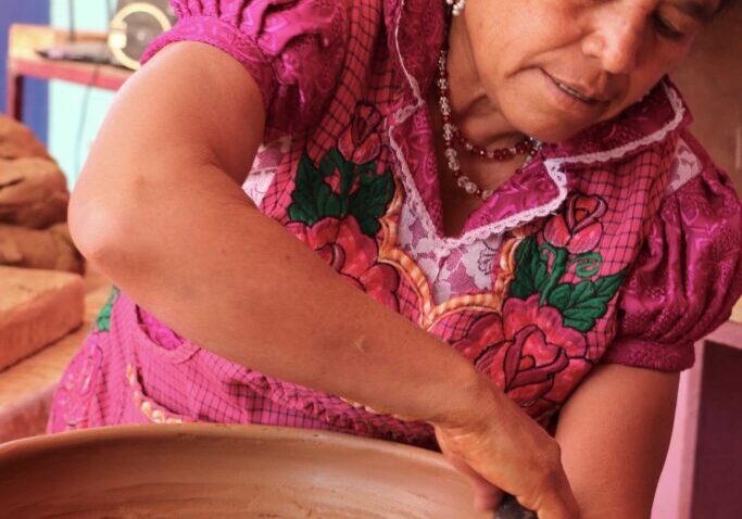 A Woman Making a Terracotta Pot