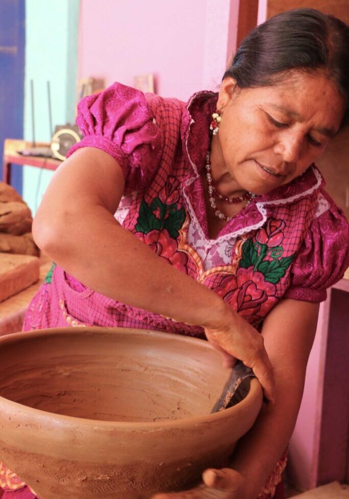 A Woman Making a Terracotta Pot